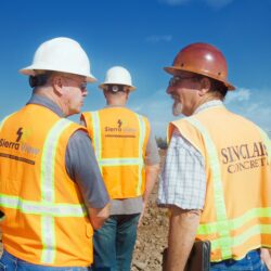 Group of workers in field